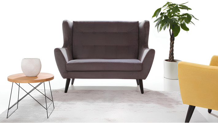 Modern gray Chesterfield sofa for three people