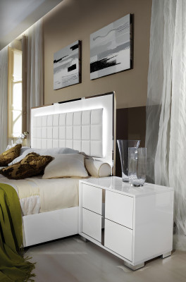 Modern white wooden bedside table