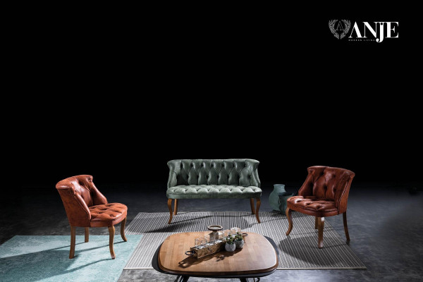Green two-seater Chesterfield sofa in faux leather for living room