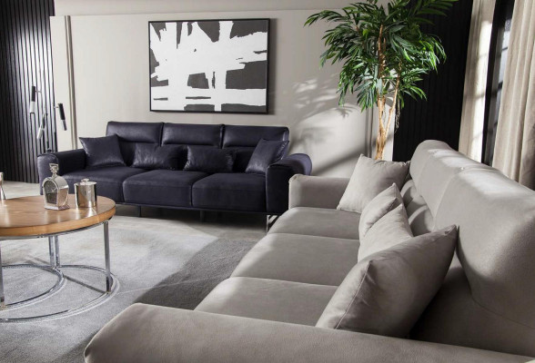 Black, soft and luxurious sofa for three people