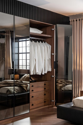 Brown glass cabinet with glass doors