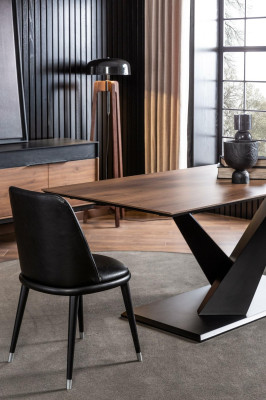 Luxurious black leather armchair, upholstered chairs, designed furniture for the living room and kitchen