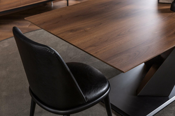 Luxurious black leather armchair, upholstered chairs, designed furniture for the living room and kitchen