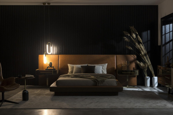 Bedroom bed design with two glass nightstands