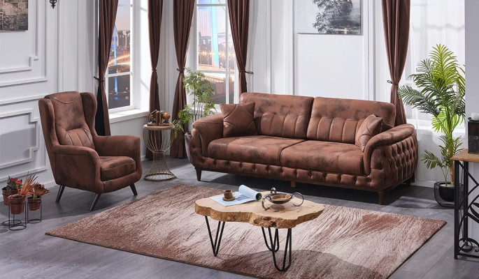 Brown three-seater canapé with designer armchair for living room