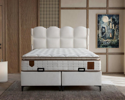 Elegant white bed with modern mattress