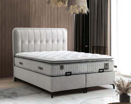Modern white bed made of fabric and wood with mattress