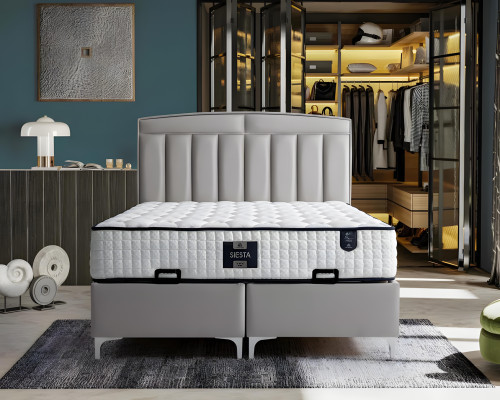 Modern gray bed made of fabric and wood with mattress