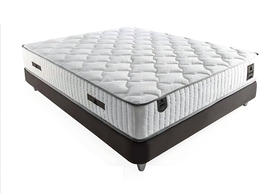 Elegant gray bed made of fabric and wood with mattress
