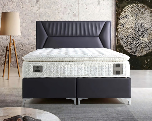 Elegant gray bed with fabric and wooden mattress