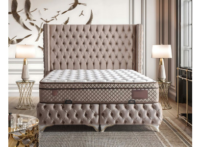Elegant bed with brown fabric