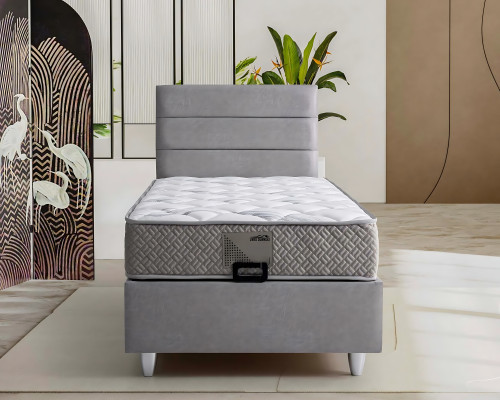 Elegant gray bed made of fabric and wood with mattress