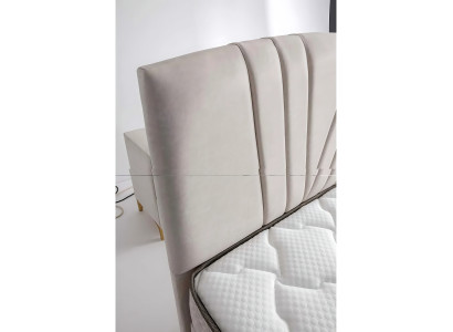 Elegant bed made of brown fabric