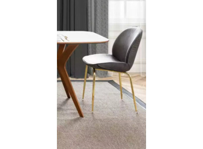 An incomparable chair made of high-quality material and stainless steel for the dining room.