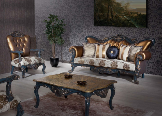 Chesterfield design armchair with a golden backrest for the living room