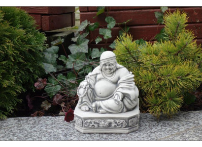 Buddha sculpture with a stone look. Large decorative sculpture for garden figure.