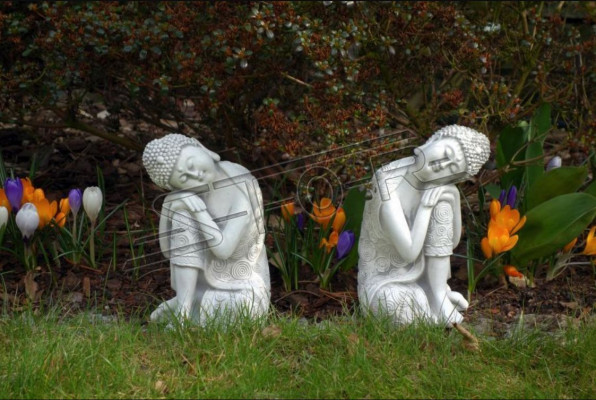 Decorative Buddha sculpture in stone look. Large figure sculpture for the garden.