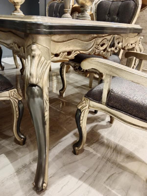 Designer dining room furniture, wooden dining table, gold table, seating for 6 people.