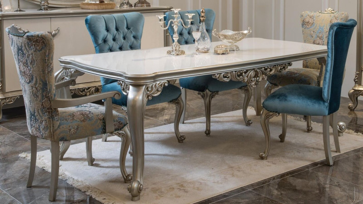 Magnificent dining table in classic design with exclusive tabletop.