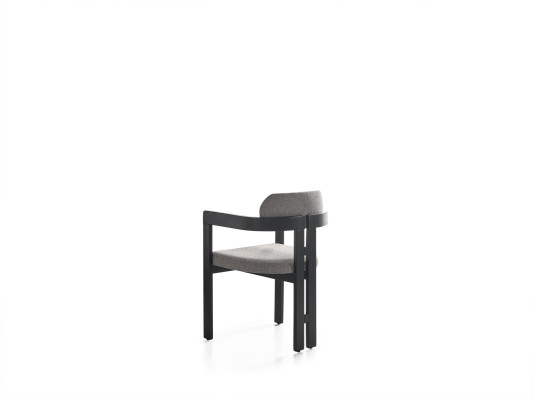 A state-of-the-art chair with an unusual shape and interesting legs with a comfortable gray-black backrest for the dining room.