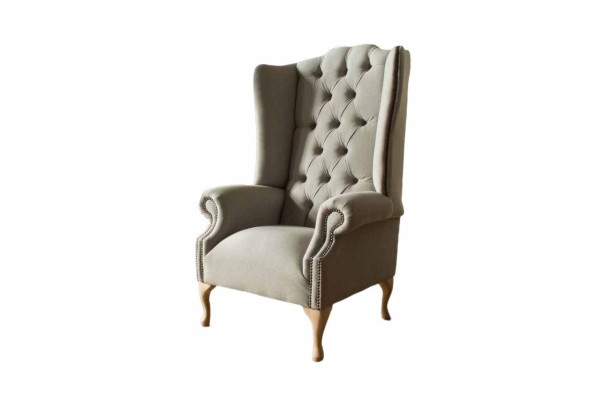 Gray wingback armchair armchair design upholstery Chesterfield fabric living room