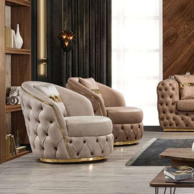A luxurious, modern armchair in a light beige tone from Chesterfield