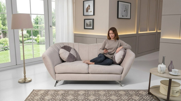 The 2-seater sofa in an elegant and modern style fits perfectly into any interior.