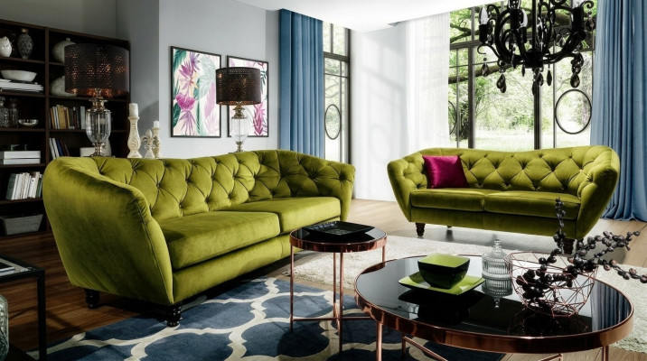 Three-seater sofa with a luxurious Chesterfield backrest in an elegant green tone