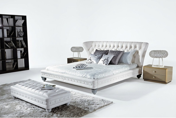 Designer double bed leather Chesterfield hotel luxury bedroom