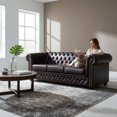 Modern three-seater faux leather sofa, cozy elegant Chesterfield