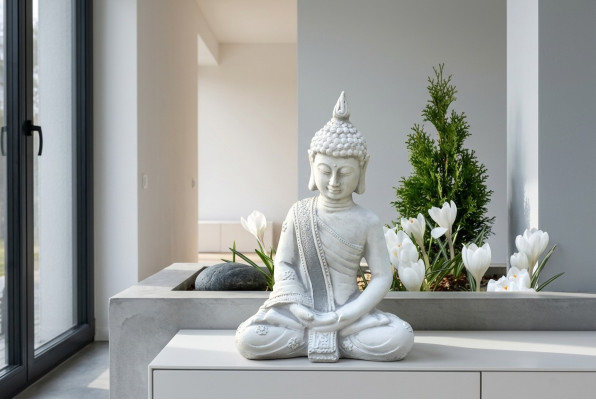 Decorative Buddha sculpture in stone look. Large sculpture for the garden.