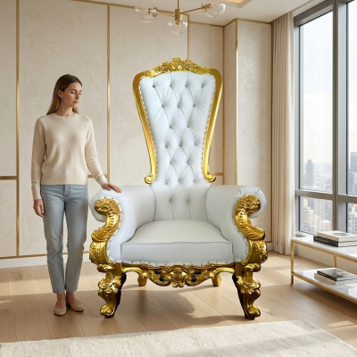 A beautiful white, ornate armchair in Baroque and Chesterfield style with Chesterfield-style elements.