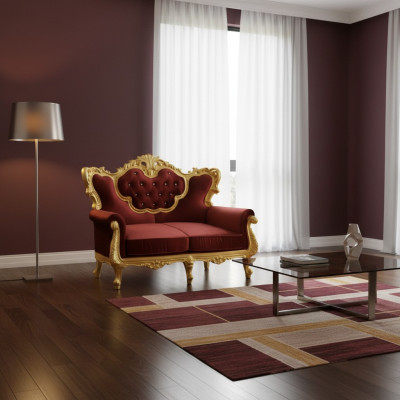 Chic 2-seater sofa with a bright color combination of elegant red and shiny gold tone in Baroque style
