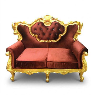 Chic 2-seater sofa with a bright color combination of elegant red and shiny gold tone in Baroque style