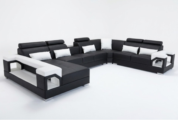 Corner sofa with ergonomic backrest and functional armrests