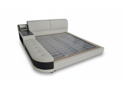Designer upholstered bed for the bedroom made from high-quality materials