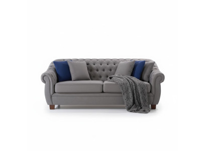 Chesterfield fabric upholstered three-seater living room couch textile design