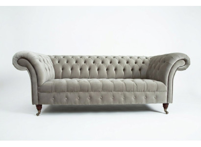Stylish light gray Chesterfield three-seater luxury living room sofa
