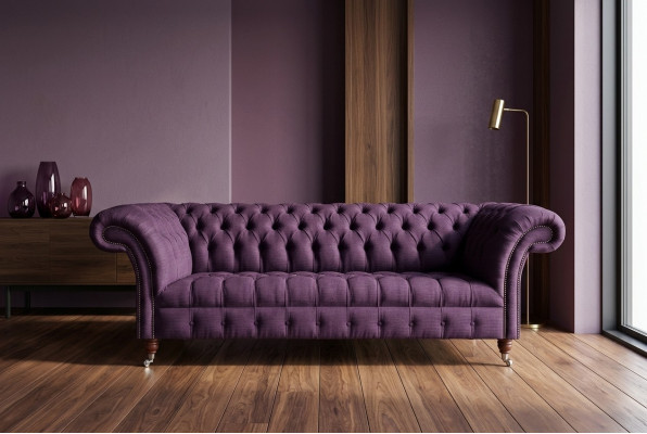 Modern purple Chesterfield three-seater living room sofa.