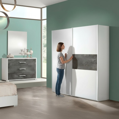 Luxury wardrobe with sliding design doors for new wooden bedroom