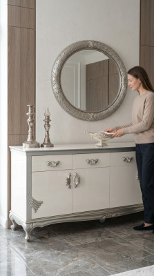 White dresser with practical drawers and elegant shelves