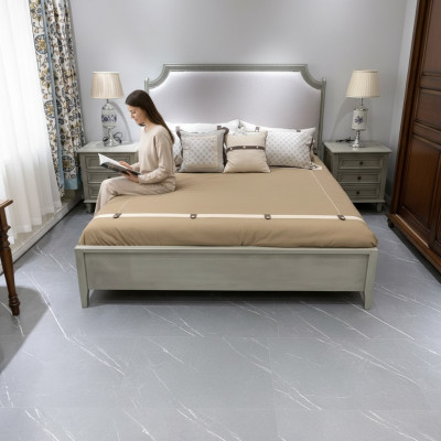 Premium bedroom set: bed and nightstands made of natural wood in gray