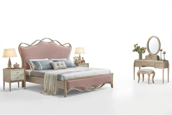 Stylish double bed in stunning pink color with two bedside tables