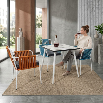 Original chairs light orange color with white legs stainless steel a soft cushion