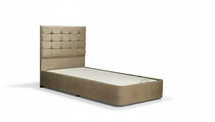 Luxurious designer bed with mattress from a European furniture manufacturer for the bedroom.