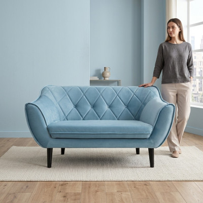 Comfortable, soft 2-seater sofa in luxurious upholstery in delicate blue color