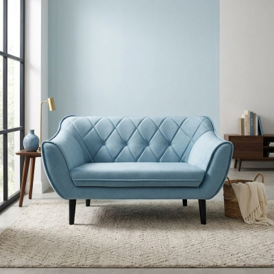 Comfortable, soft 2-seater sofa in luxurious upholstery in delicate blue color