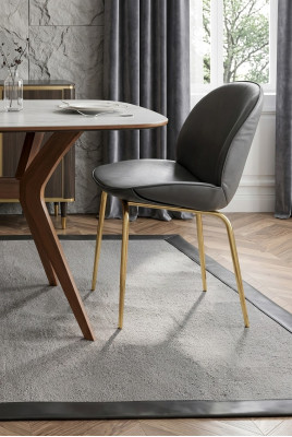 An incomparable chair made of high-quality material and stainless steel for the dining room.