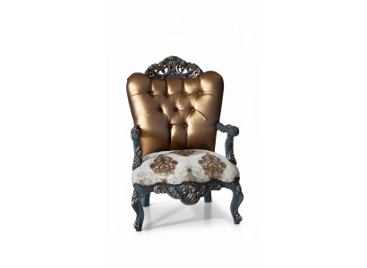Chesterfield design armchair with a golden backrest for the living room