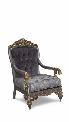 Elegant classic armchair with decorative patterns in Chesterfield design.